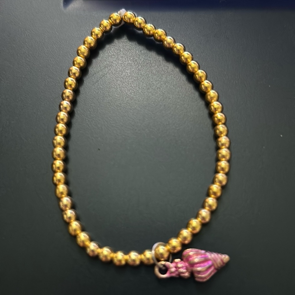 Gold Beaded Bracelet with Pink seashell Charm